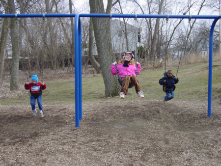 Josh swings after Daniela gives him a starter push